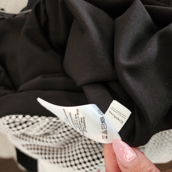 Bebe mesh fitted skirt. Black and White. SIZE: Small - Picture 9 of 14